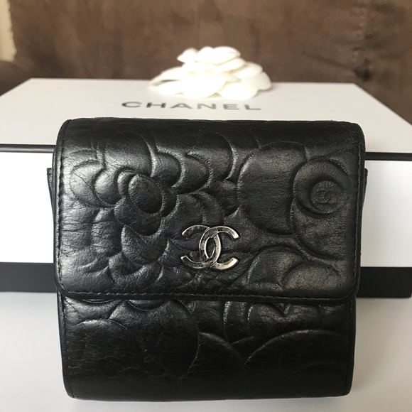 CHANEL Handbags - Chanel Lambskin Camellia Embossed TwoSided Wallet.